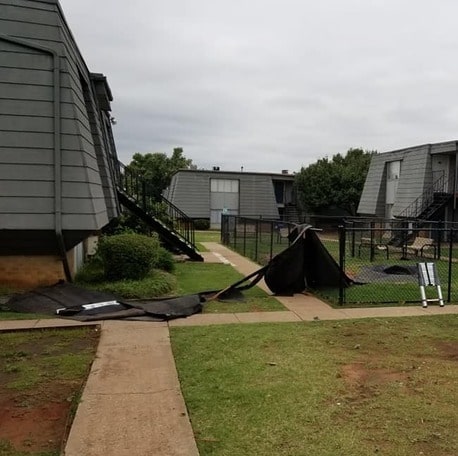 Part of a roof blown off an apartment complex due to Oklahoma high winds.