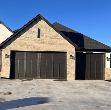 Garage door repair and replacement in Oklahoma by Belter Roofing and Construction.