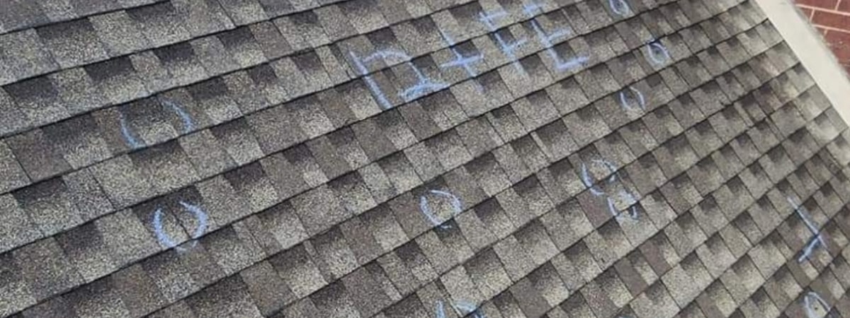 Example of a hail damaged roof after a heavy Oklahoma thunderstorm.