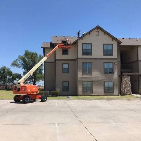 Belter Roofing inspecting a commercial roof in Oklahoma.