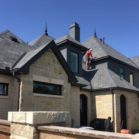 Belter Roofing inspecting a residential roof in Oklahoma.