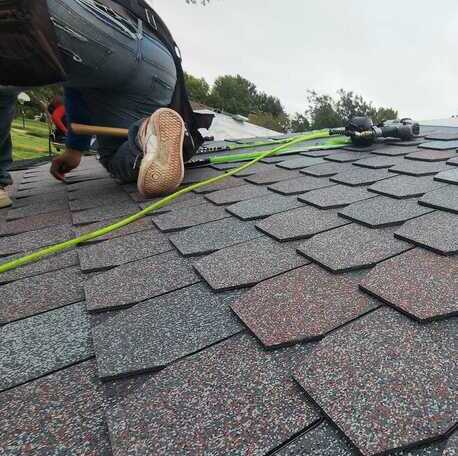 Belter Roofing fixing a residential roof after a severe Oklahoma thunderstorm.