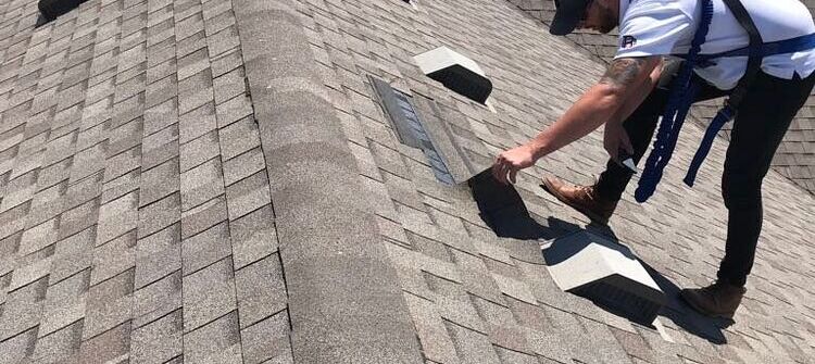 Missing shingles found during an Oklahoma roof maintenance inspection.