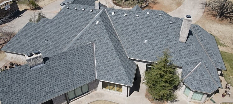 A residential roof in Oklahoma replaced by Belter Roofing and Construction.
