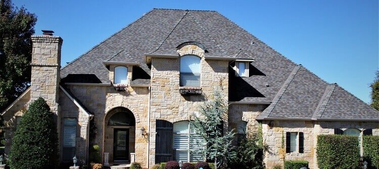 Oklahoma residential roof replaced after an insurance claim by Belter Roofing and Construction.