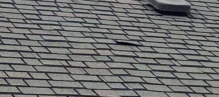 Lifted shingles is a common sign of Oklahoma rood damage that should not be ignored.